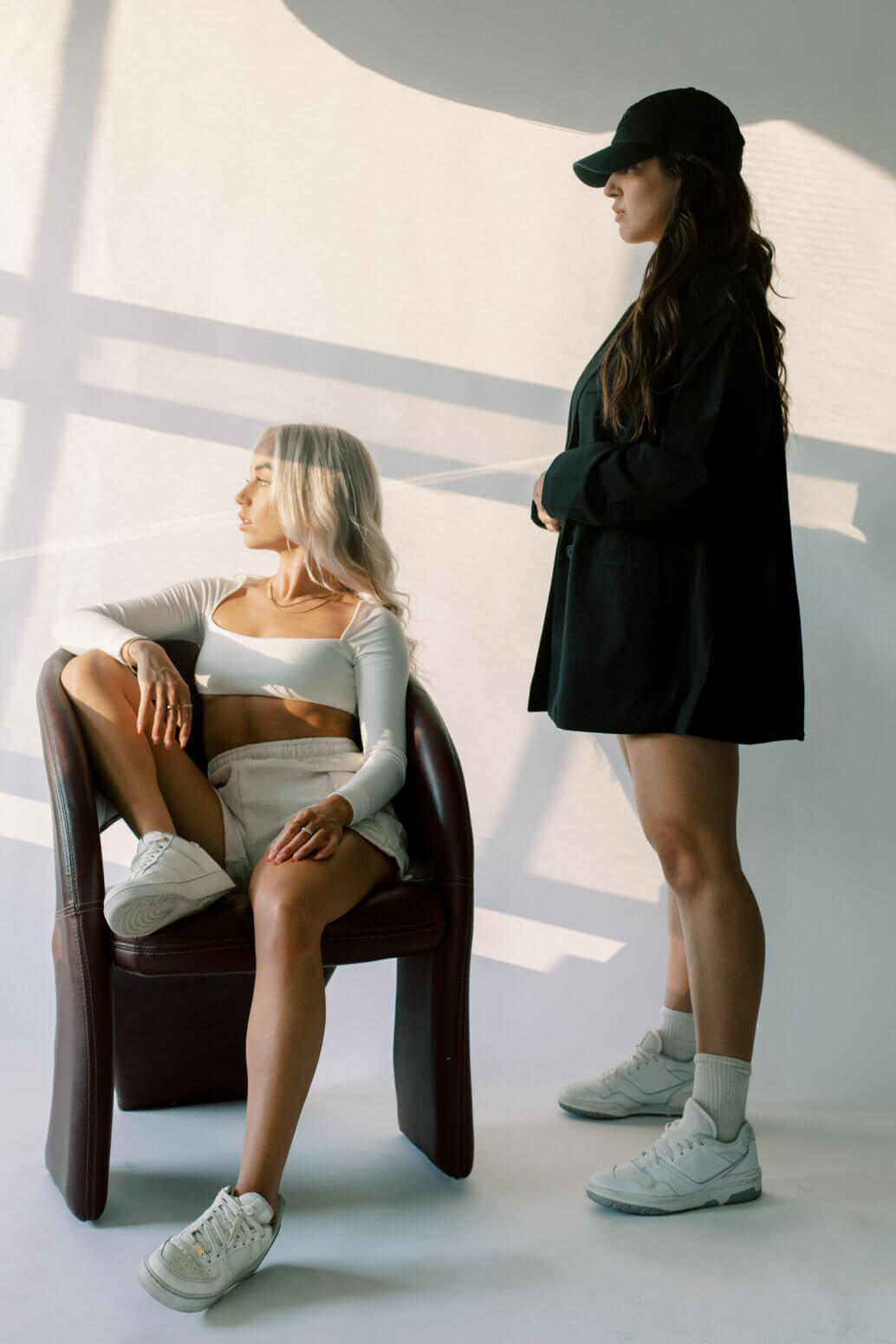 Two women wearing athleisure clothing